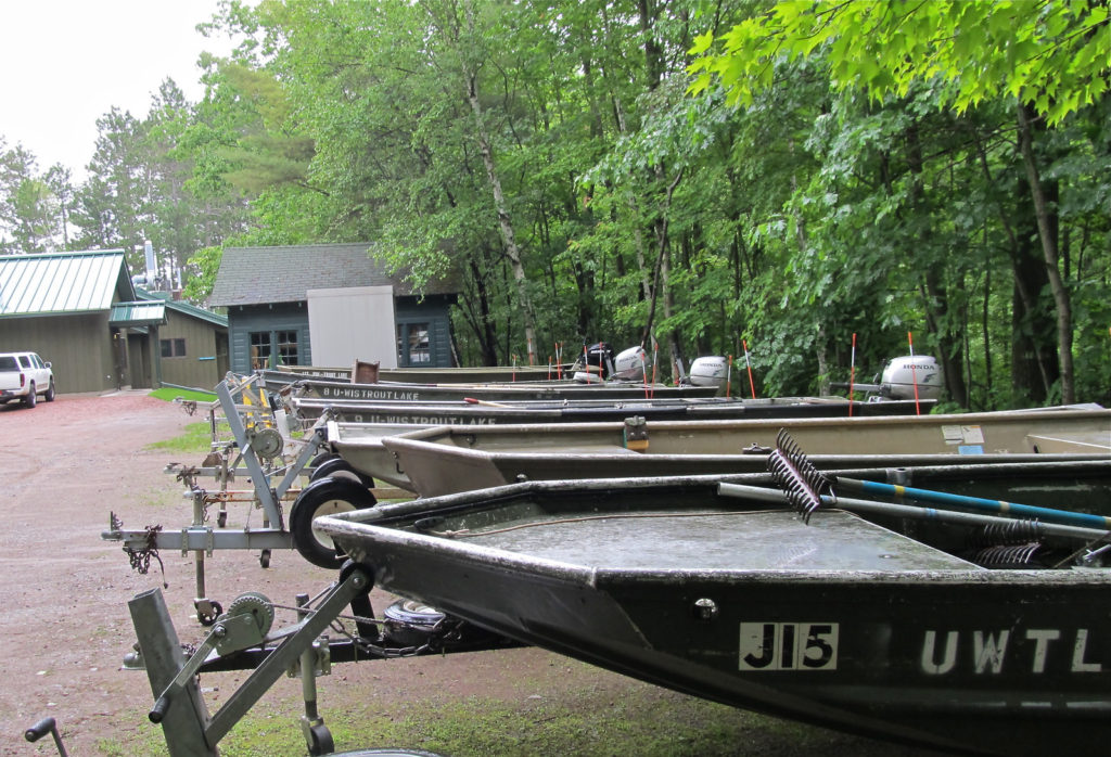 Boat fleet and main station building at Trout Lake Station,