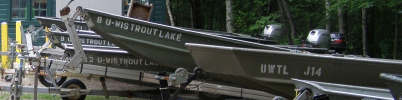 Close up photo of john boats and motors at TLS
