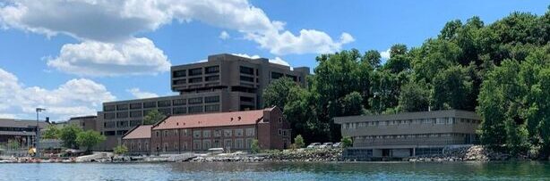 View of CFL Hasler Lab (right) and Water Science and Engineering (left) from Lake Mendota.